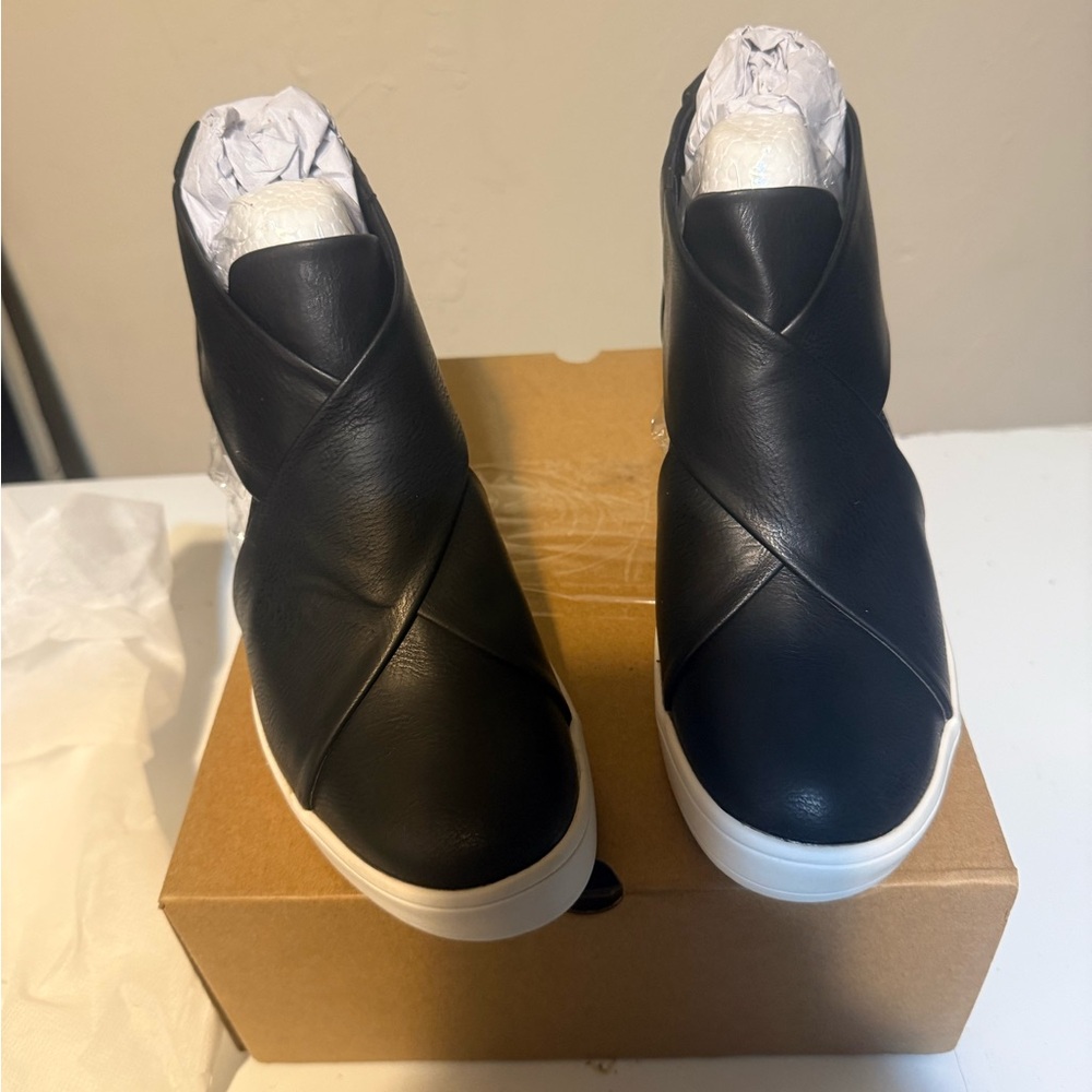 Chic Black Leather High-Top Sneakers